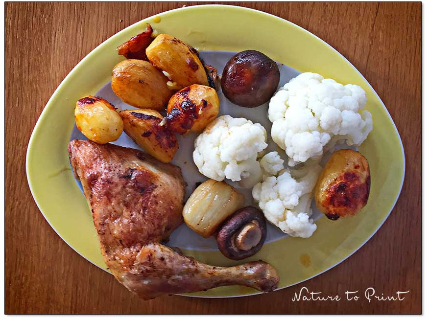 Hähnchenschenkel mit Blumenkohl und Ofenkartoffeln