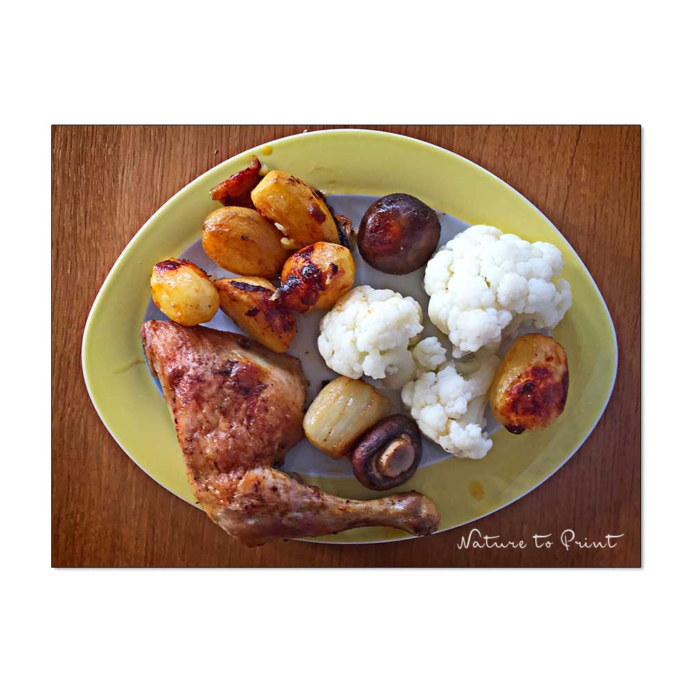 Hähnchenschenkel mit Blumenkohl und Ofenkartoffeln