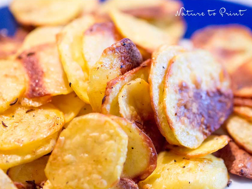 Kross gebackene Kartoffelchips dem Ofen Kross gebackene Kartoffelchips dem Ofen